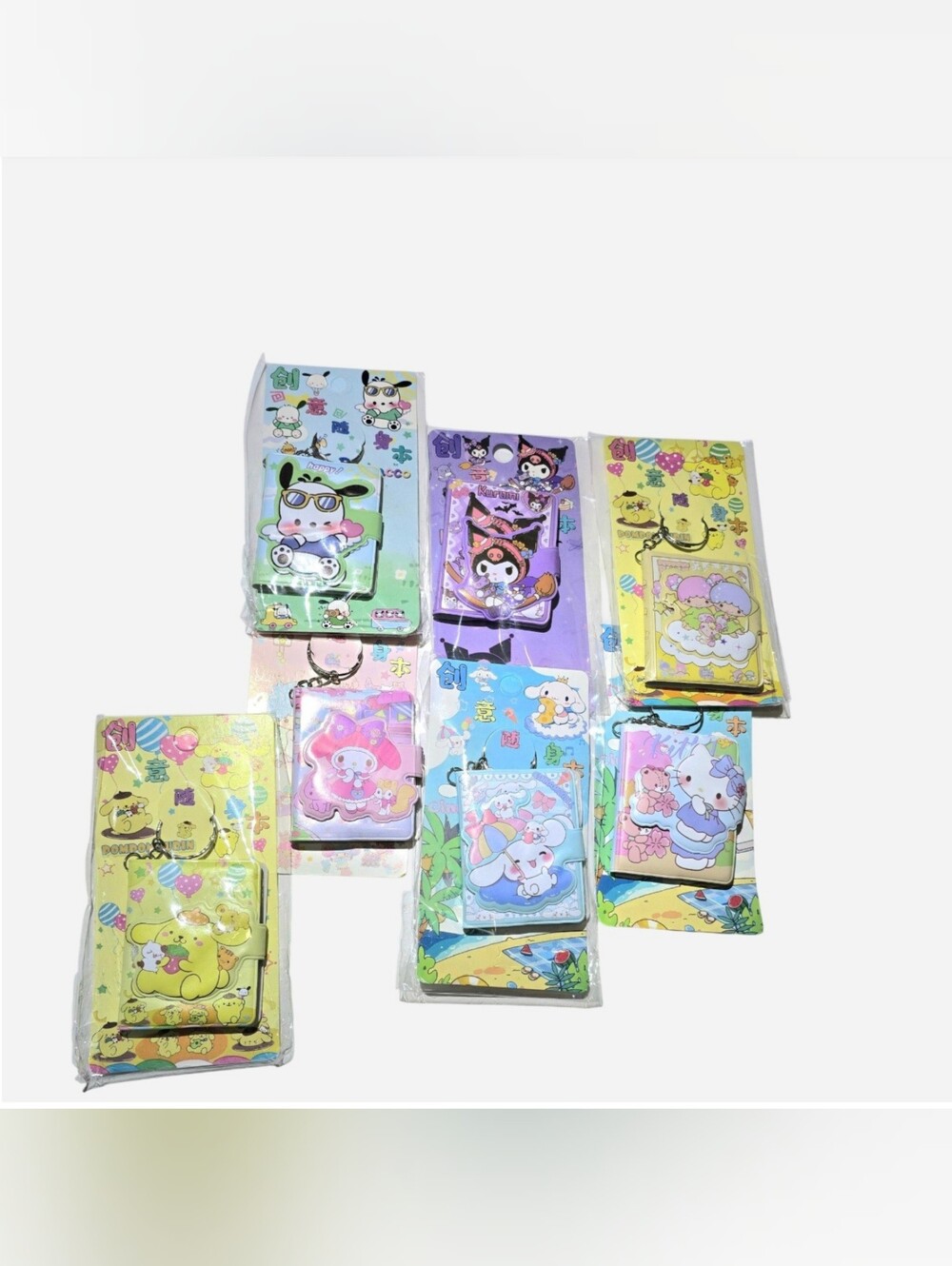 Sanrio Hello Kitty, Kuromi & Friends Mini Notebook Keychains Bundle Of 7